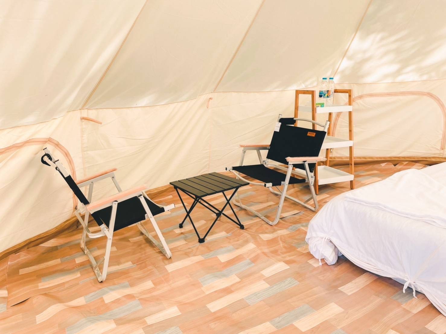 outdoor seating area at a mae ngam deluxe camping tent, surin islands